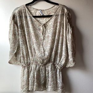 Sheer blouse with smocking detail on sleeves